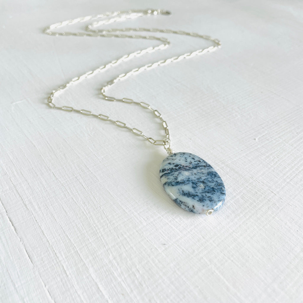 Agate Pendant Denim Blue on a paperclip sterling chain on a white background and
