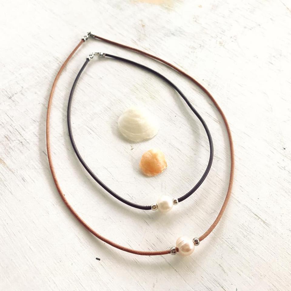Pearl Of Wisdom Choker Necklace by ZEN by Karen Moore showing black and natural straps with two seashells