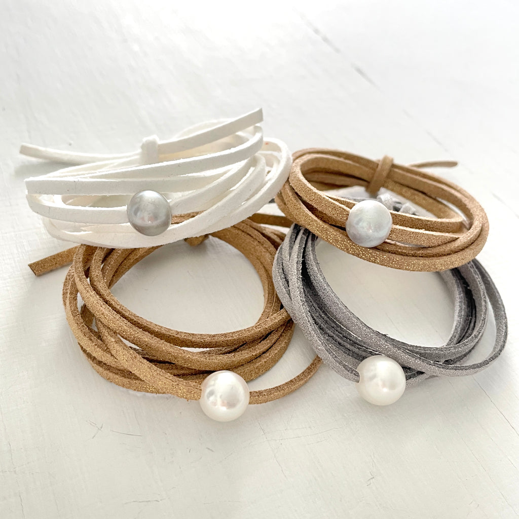 Pearl of Wisdom Pure White Eco Zen Wrap Jewelry by ZEN by Karen Moore on white wood