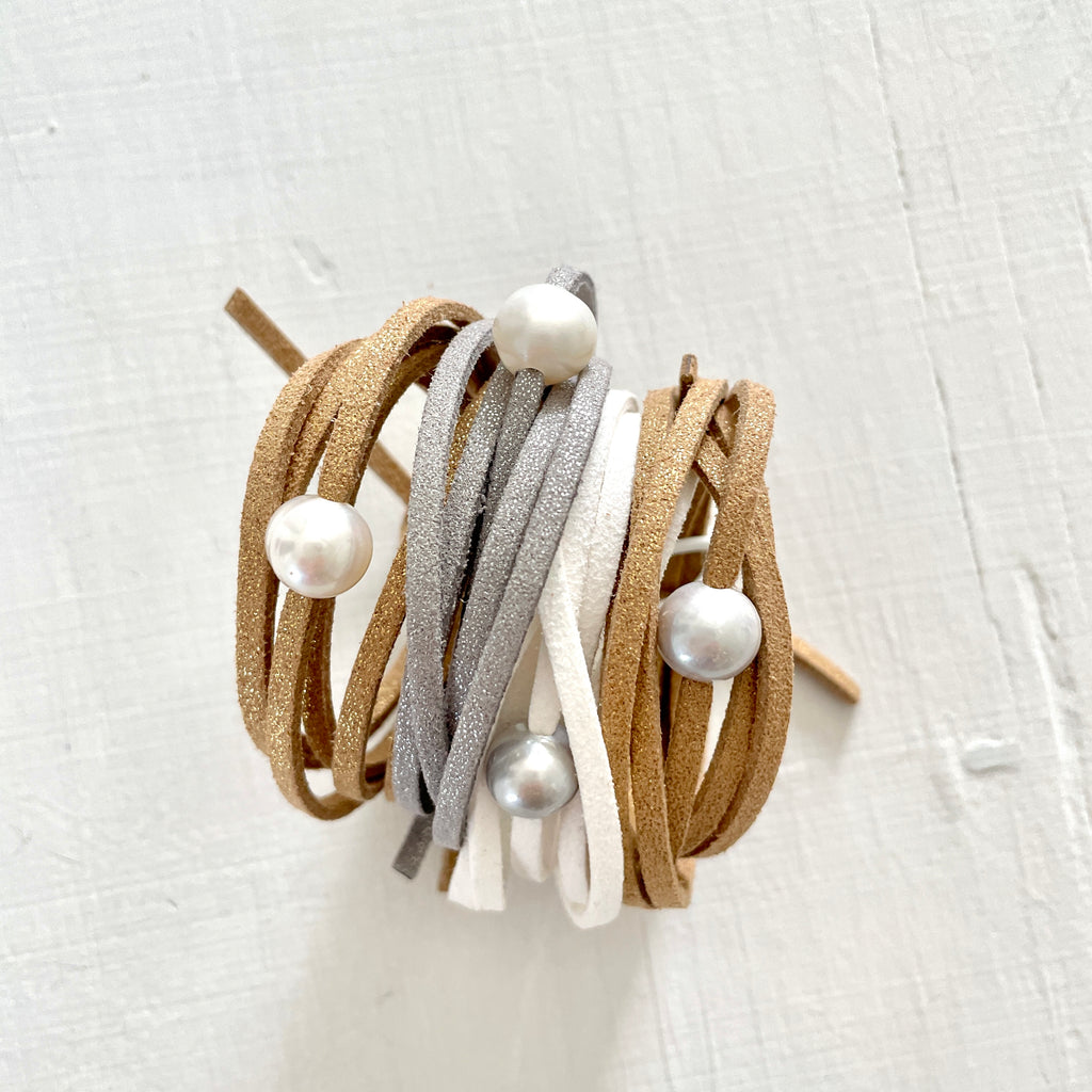 Pearl of Wisdom Shimmer Sand Eco ZEN Wrap® Jewelry by ZEN by Karen Moore on white wood