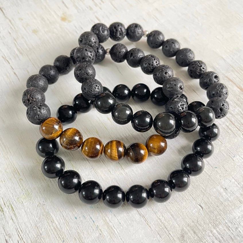 Fortunate Spirit Tiger Eye & Lava Stone Menz ZEN Bracelet by ZEN by Karen Moore on white wood background