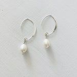 Classy Crescent Pearl  Earrings by ZEN by Karen Moore Jewelry silver on white background