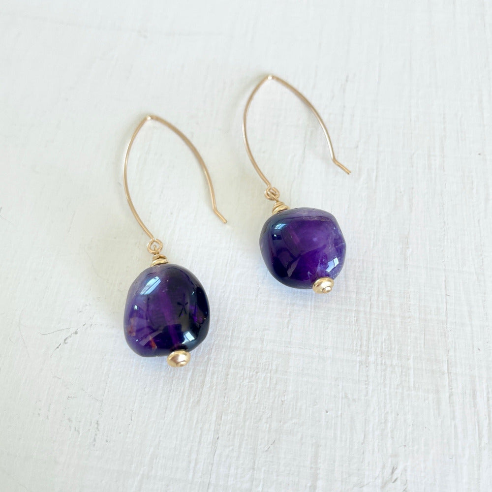 14kt gold-fill Royal Amethyst Earrings by ZEN by Karen Moore Jewelry overhead view on white background