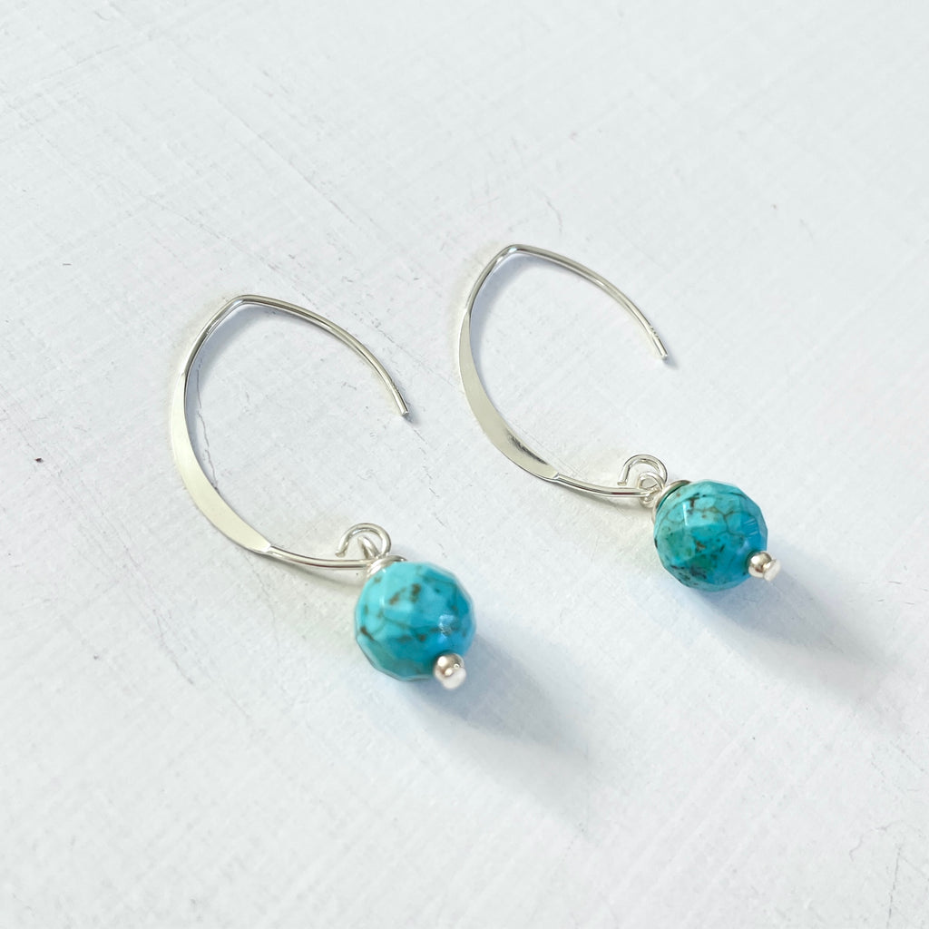 Classy Turquoise Crescent Earrings by ZEN by Karen Moore on white background close up