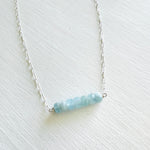 Clear Your Mind Aquamarine Necklace by ZEN by Karen Moore jewelry in sterling silver close up on white background