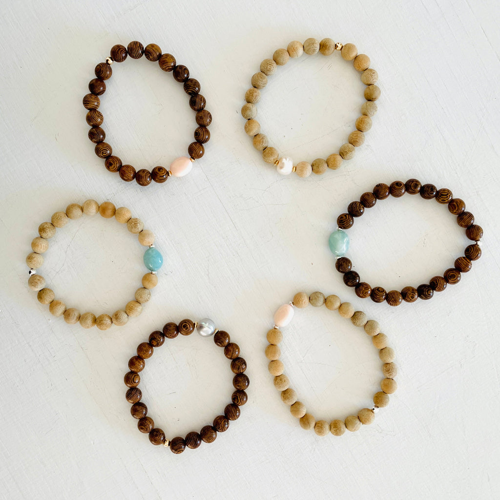 Mojo Amazonite Tiger Wood Bracelet by ZEN by Karen Moore on white wood background