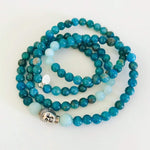 Apatite & amazonite Buddha Bliss ZEN Mini Mala prayer beads by Zen by Karen Moore wrapped as a bracelet on white background