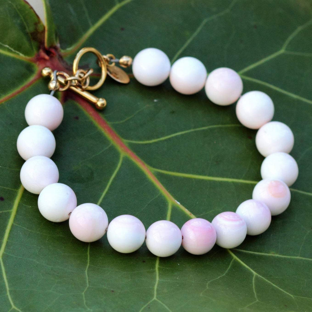 Classic Conch Shell Bracelet by ZEN by Karen Moore jewelry with silver clasp on leaf
