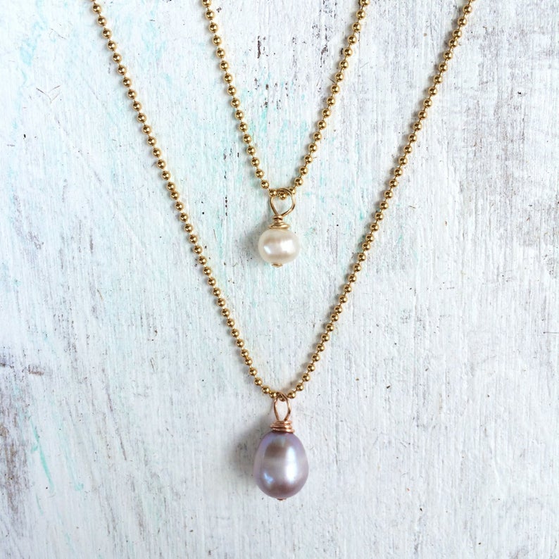 Simply Pearl-Fect & Island Love pearl necklaces by ZEN by Karen Moore  on white wood