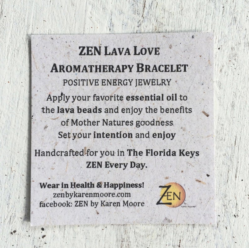 African turquoise, lapis lazuli & lava stone Take Good Care Aromatherapy Bracelet by ZEN by Karen Moore on white wood