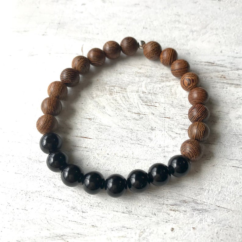 Just Do It tiger wood and obsidian bracelet by ZEN by Karen Moore on white wood