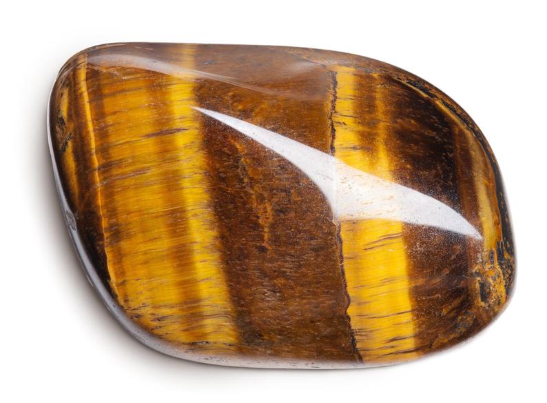 Tiger eye gemstone by ZEN by Karen Moore on white background