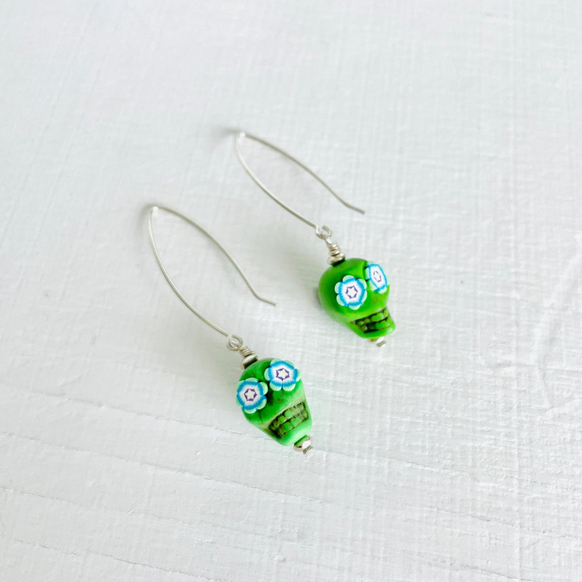 ZEN by Karen Moore Sugar Skull earrings on a white background