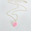 ZEN by Karen Moore heart shaped Conch Shell Necklace on a 14kt gold-filled on paperclip chain on a white backgroun