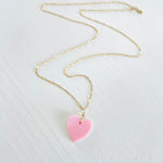 ZEN by Karen Moore heart shaped Conch Shell Necklace on a 14kt gold-filled on paperclip chain on a white backgroun