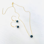 Black Onyx Jewelry, Earrings and Adjustable Necklace by ZEN by Karen Moore gold adjustable chain on white background