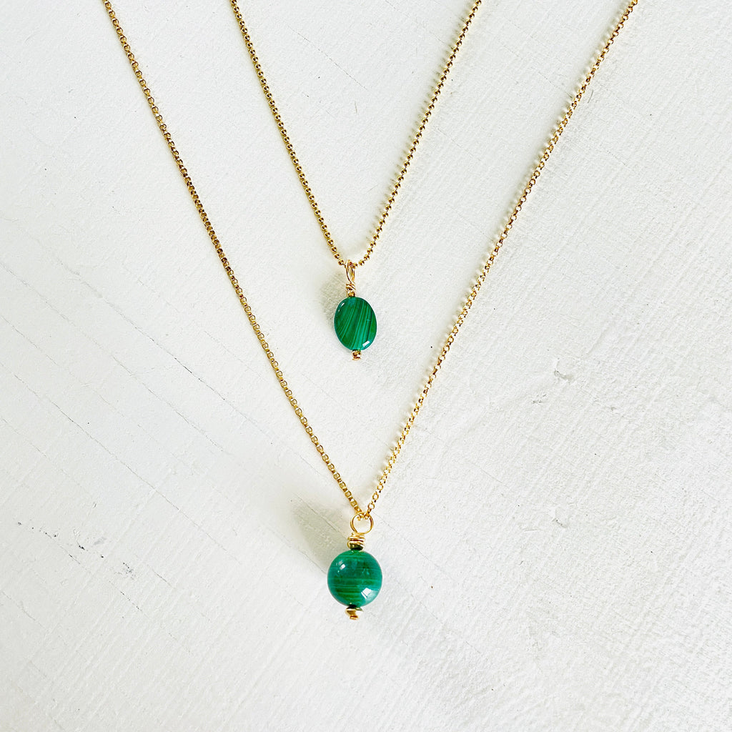ZEN by Karen Moore green Malachite gemstone necklaces on gold chain on white background