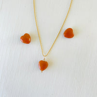 Aventurine gemstone charm necklace on 14kt gold filled ball chain on a white background