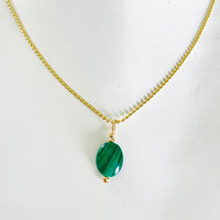ZEN by Karen Moore green Malachite gemstone necklace on gold chain on white background