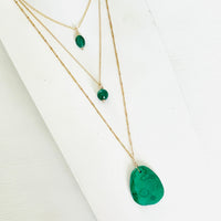 ZEN by Karen Moore green Malachite gemstone necklaces on gold chain on white background