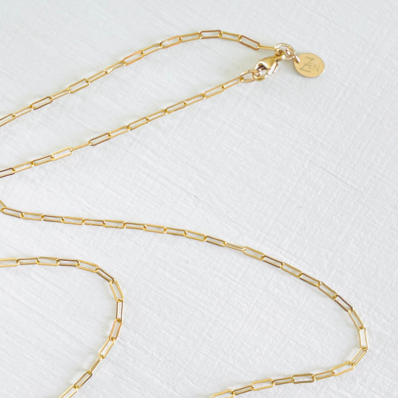 ZEN by Karen Moore 14kt gold-filled paperclip chain on a white background