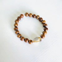 Mojo Amazonite Tiger Wood Bracelet by ZEN by Karen Moore on white wood background