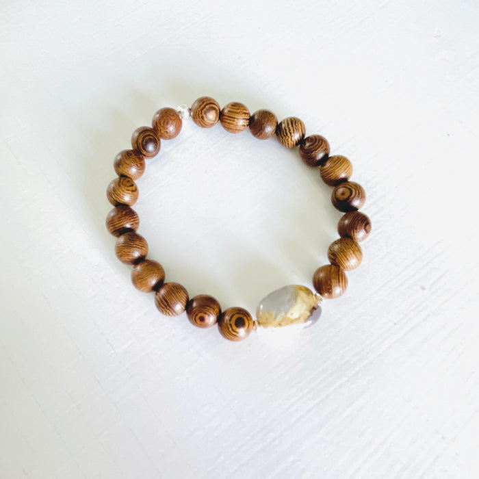 Mojo Amazonite Tiger Wood Bracelet by ZEN by Karen Moore on white wood background