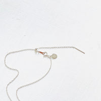Floating Adjustable Necklace by ZEN by Karen Moore showing silver adjustable chain on white background