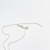 Floating Adjustable Necklace by ZEN by Karen Moore showing silver adjustable chain on white background