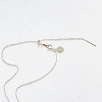 Floating Pearl Adjustable Necklace by ZEN by Karen Moore showing silver adjustable chain on white background