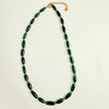 green jade gemstone necklace on white background with gold accents
ZEN-by-Karen-Moore-Jewelry_Indian-Jade-Necklace
