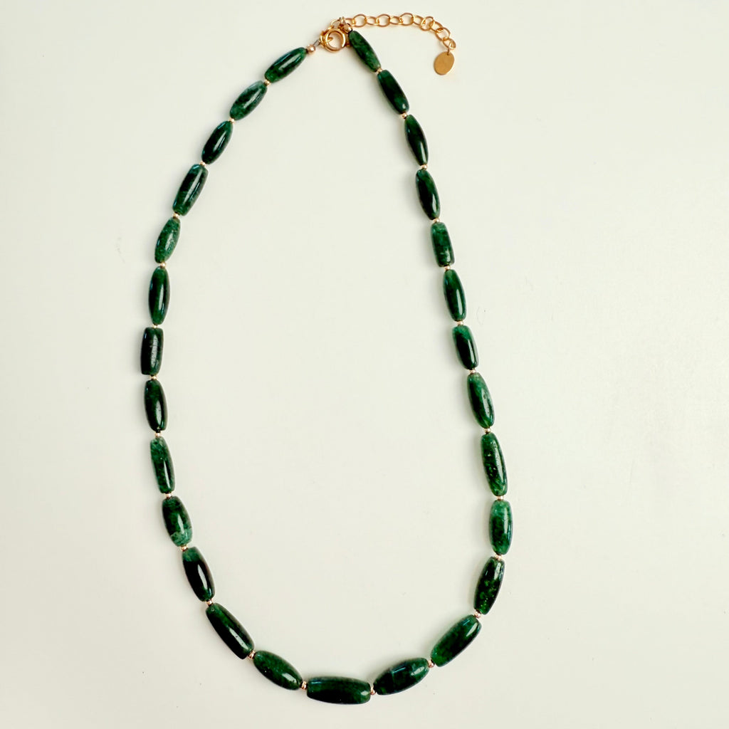 green jade gemstone necklace on white background with gold accents
ZEN-by-Karen-Moore-Jewelry_Indian-Jade-Necklace