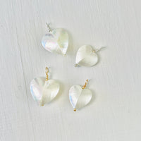 Puffy_Heart_Nautilus_Necklace Pendants on white background