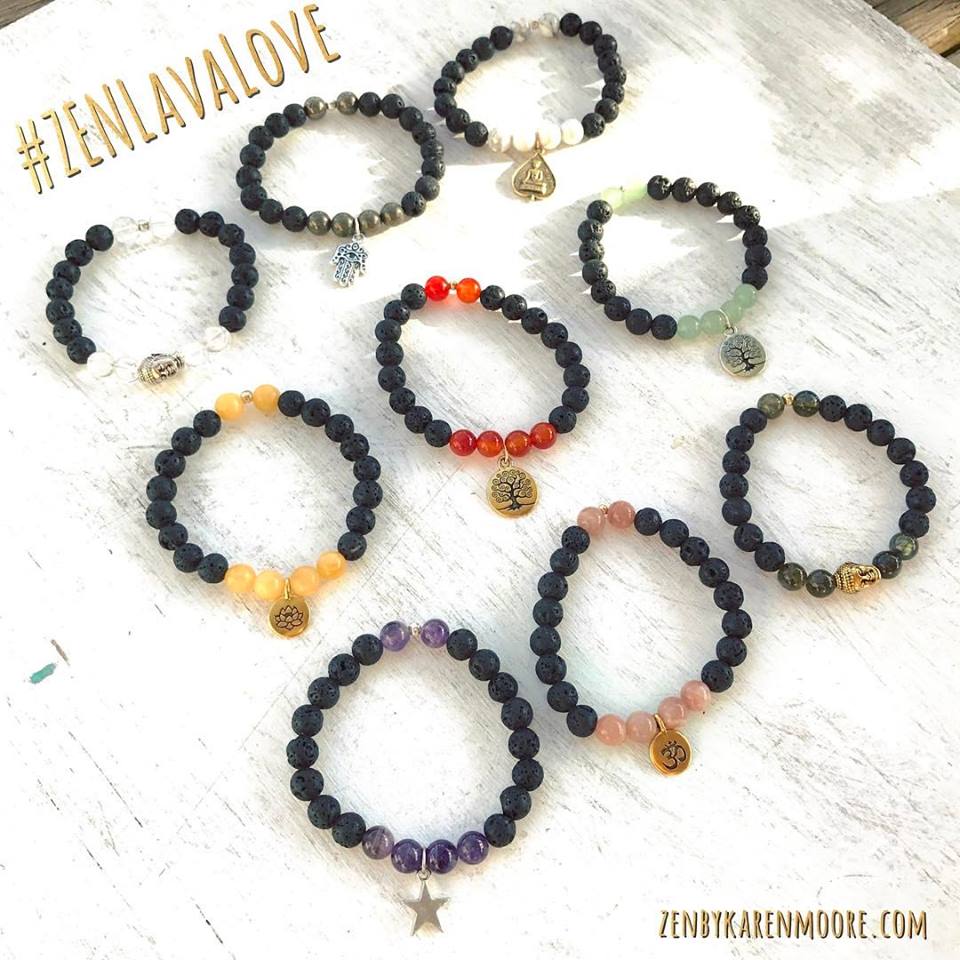 Overhead laydown of multiple Lava Love Aromatherapy Bracelets by ZEN by Karen Moore on white wood