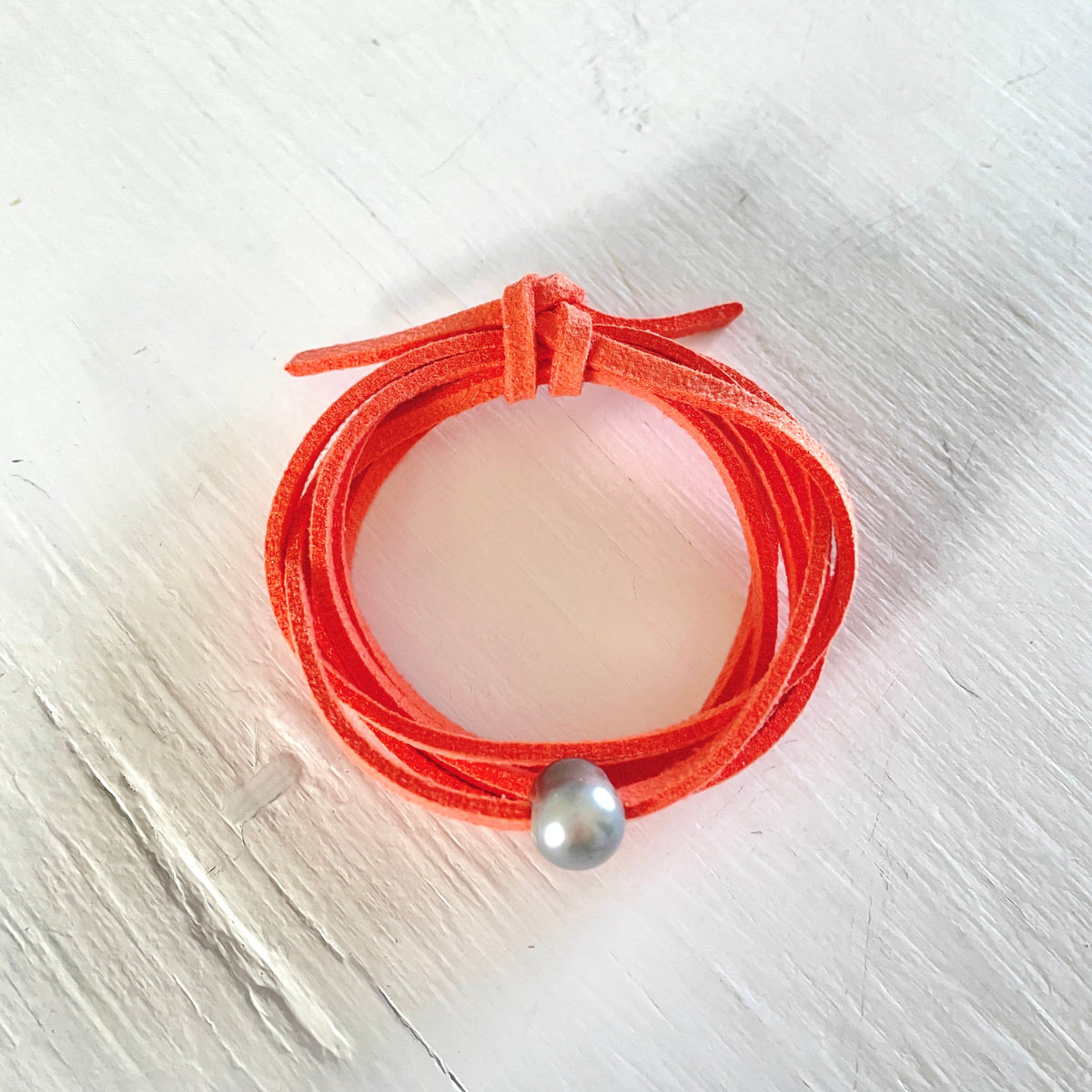 Pearl of Wisdom Coral VIbes Eco Zen Wrap Jewelry by ZEN by Karen Moore on white wood