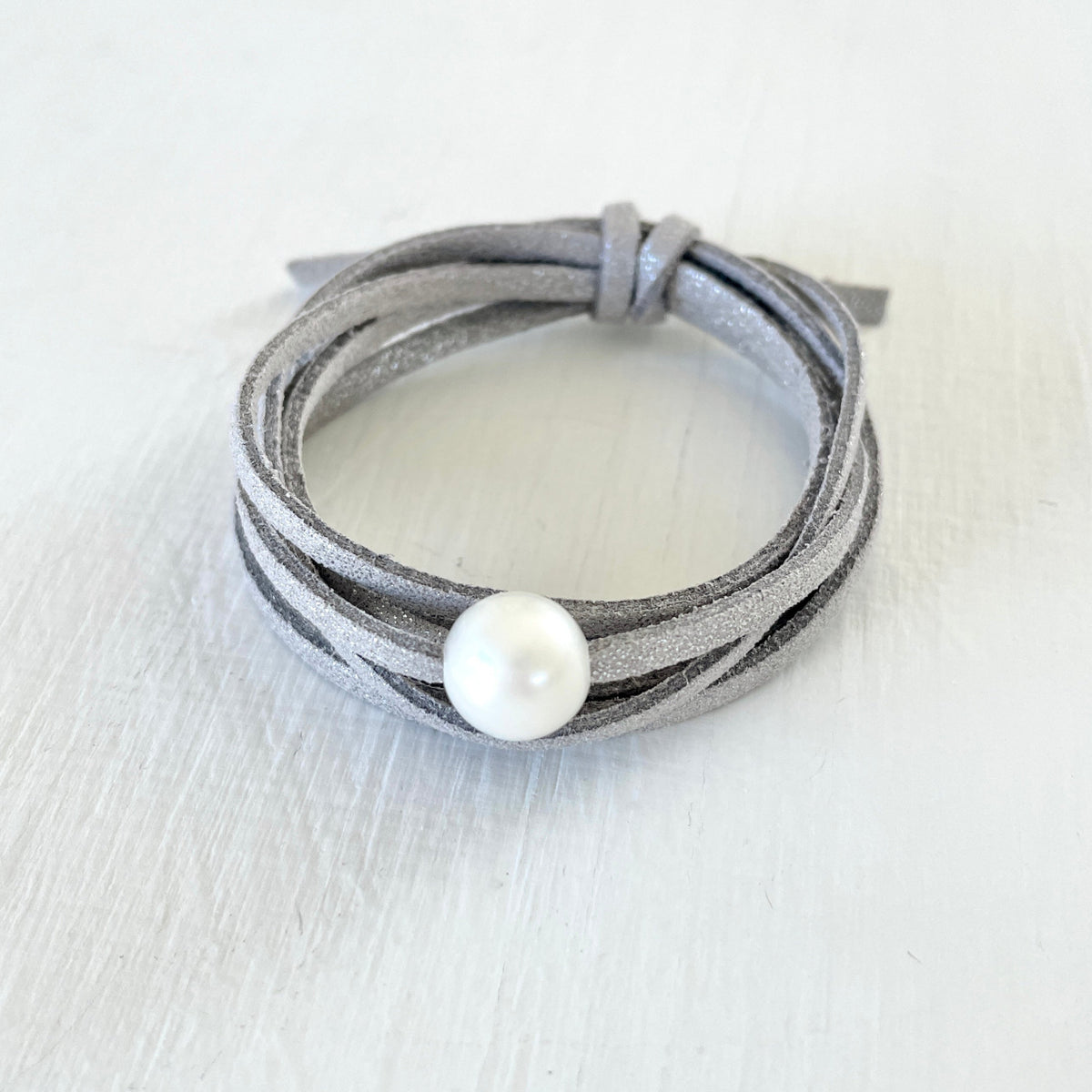Pearl of Wisdom Shimmer Stone Eco Zen Wrap Jewelry by ZEN by Karen Moore on white wood