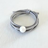 Pearl of Wisdom Shimmer Stone Eco Zen Wrap Jewelry by ZEN by Karen Moore on white wood