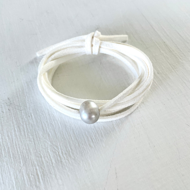 Pearl of Wisdom Pure White Eco Zen Wrap Jewelry by ZEN by Karen Moore on white wood