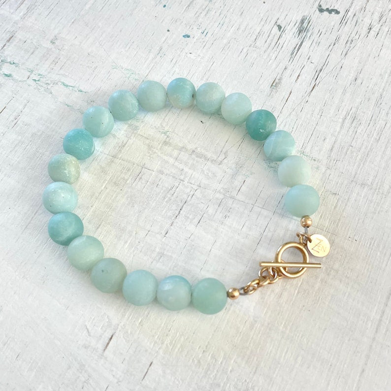 Be Brilliantly You Amazonite Bracelet by ZEN by Karen Moore overhead view on white wood