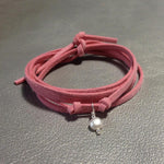 Wise Up To Love Eco Zen Wrap Jewelry by ZEN by Karen Moore with pink strap on teal & gold background