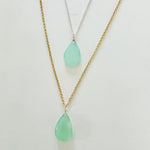 The Harmony & Joy Chalcedony Pendant Necklace duo of 14k gold and sterling silver chains by ZEN by Karen Moore on white background