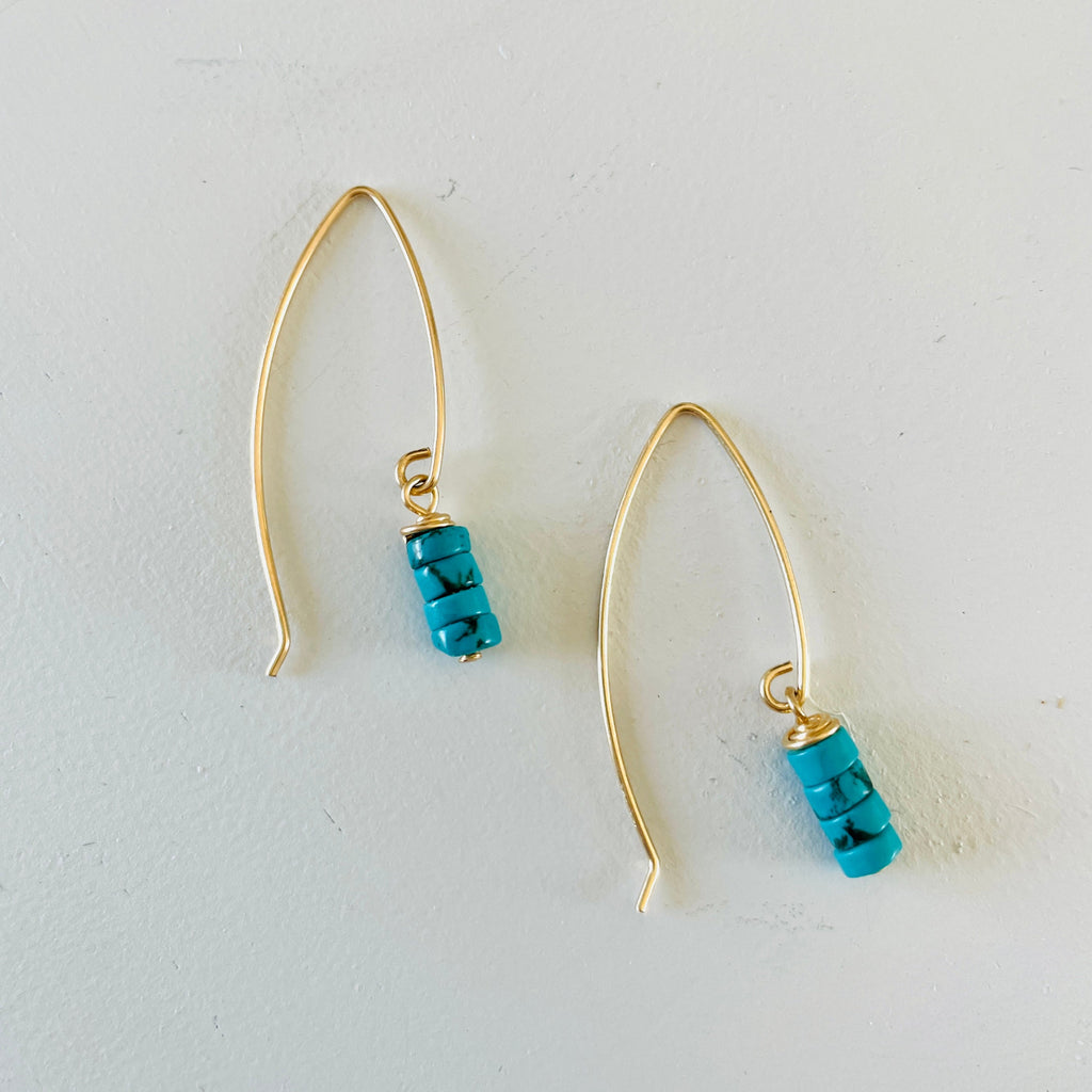 Hooked on Turquoise Earrings by ZEN by Karen Moore on white background close up