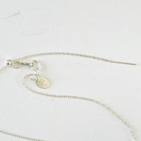 Adjustable chain and clasp on Floating chain by ZEN by Karen Moore on white background