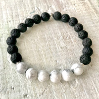 Howlite & lava stone Be Bliss Aromatherapy Bracelet by ZEN by Karen Moore on white wood