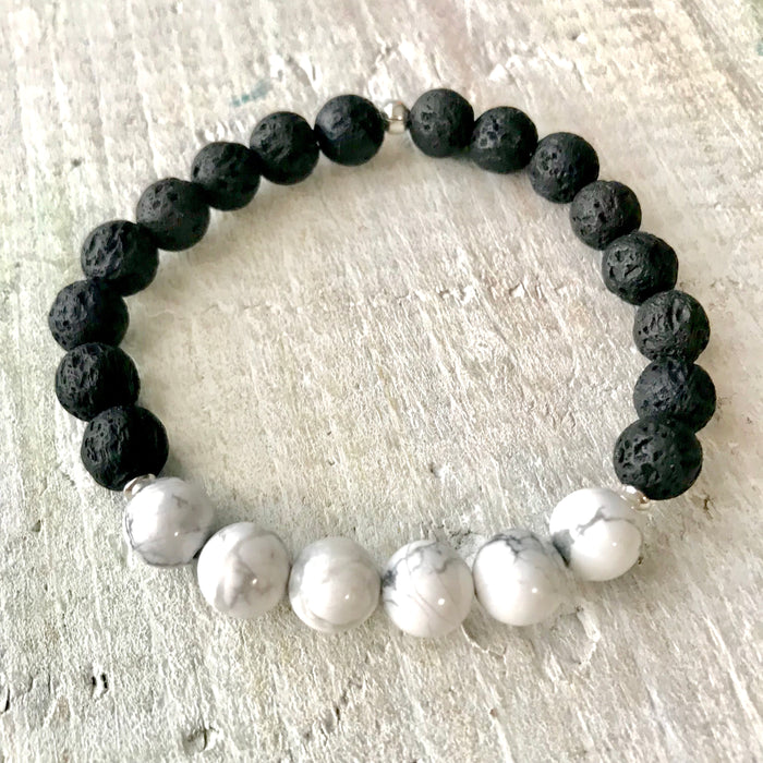 Howlite & lava stone Be Bliss Aromatherapy Bracelet by ZEN by Karen Moore on white wood