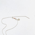 Floating Pearl Adjustable Necklace by ZEN by Karen Moore showing silver adjustable chain on white background