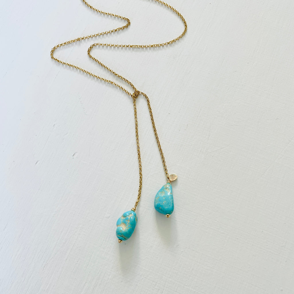 Turquoise Strength ZEN Wrap Necklace in 14K gold by ZEN by Karen Moore on white background