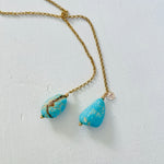 Turquoise Strength ZEN Wrap Necklace  in 14K gold by ZEN by Karen Moore zoomed in gem view on white background