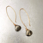Magnificent Manifestor pyrite earrings in 14k gold by ZEN by Karen Moore on gold speckled background