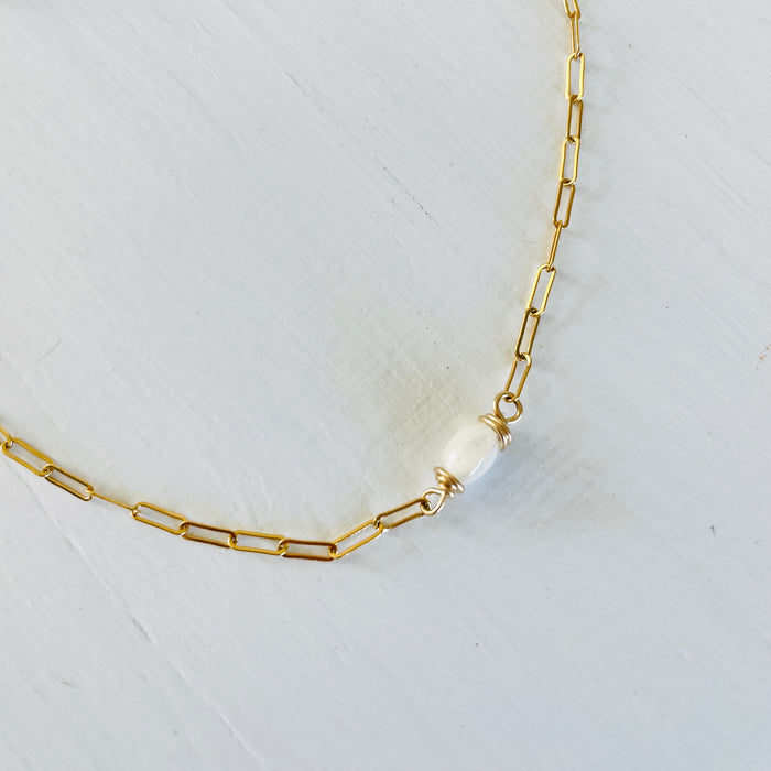 Nurtured by the Sea Mother of Pearl Anklet by ZEN by Karen Moore Jewelry overhead close up of pearl  on white background